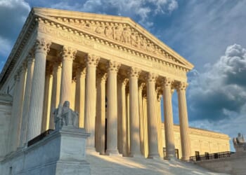 The Supreme Court Building stands during dawn.