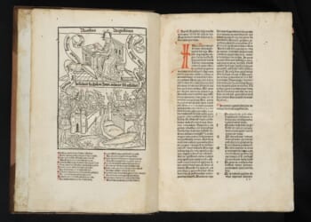 Illuminated pages of a book written in Latin by Augustine of Hippo.