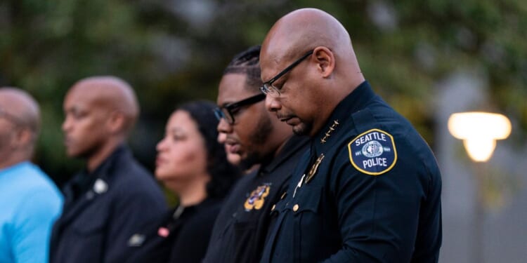 Seattle Police Chief Shon Barnes attends a vigil a day after the Bite of Seattle food festival shooting at Seattle Center on July 27, 2026, in Seattle, Washington.