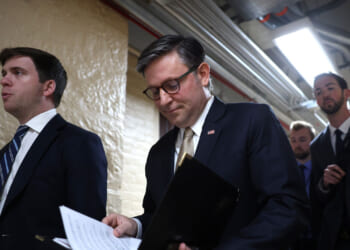 Speaker of the House Mike Johnson (R-LA) walks to a news conference.