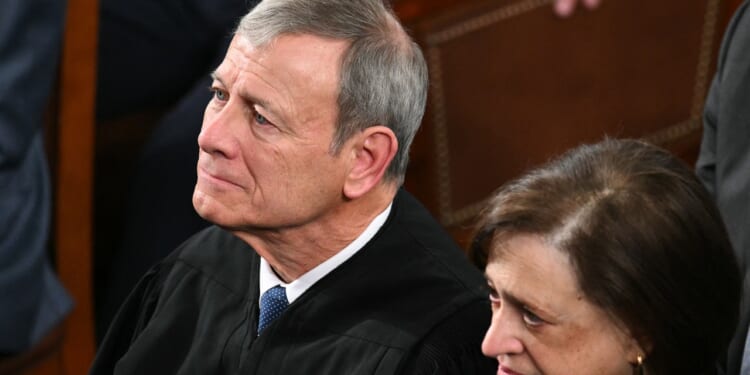 (L/R) Supreme Court Chief Justice John Roberts and Supreme Court Justice Elena Kagan