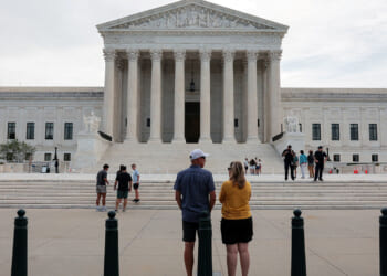 People stand outside the U.S. Supreme Court in Washington, D.C., U.S., June 22, 2026. REUTERS/Kylie Cooper/File Photo