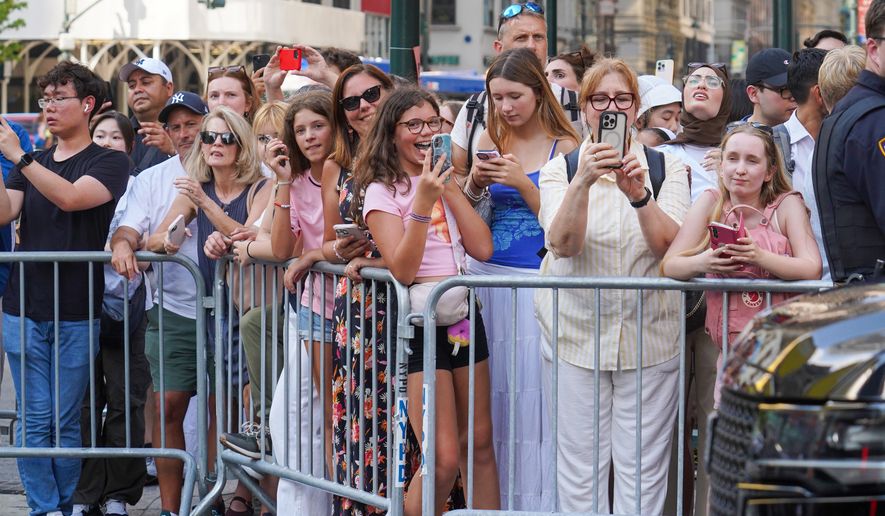 Fans line up outside of Madison Square Garden ahead of a reported wedding between singer Taylor Swift and National Football League player Travis Kelce on Friday, July 3, 2026, in New York. (AP Photo/Ryan Murphy)