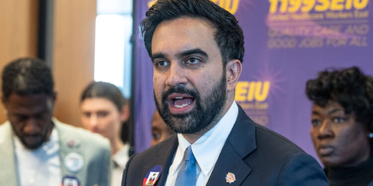 Zohran Mamdani talks to reporters at SEIU event.