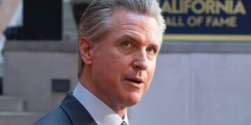 Gavin Newsom looks to photographers at the 19th California Hall of Fame ceremony on March 19, 2026.