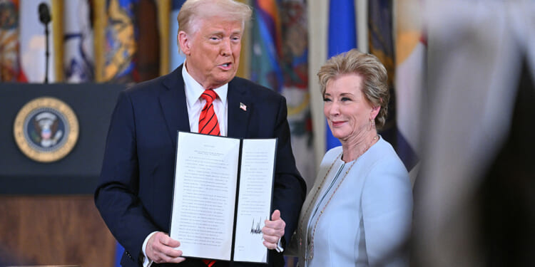 President Donald Trump and Department of Education Secretary Linda McMahon Standing
