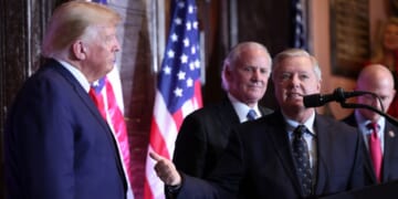 U.S. Sen. Lindsay Graham (R-SC) ushers towards President Donald Trump at an event at the South Carolina State House on Jan. 8, 2023 in Columbia, South Carolina.
