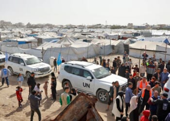 Alexander De Croo, administrator of the United Nations Development Programme, arrives in a UN convoy to visit Gaza City, on Feb. 16, 2026.