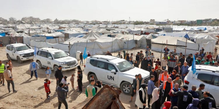 Alexander De Croo, administrator of the United Nations Development Programme, arrives in a UN convoy to visit Gaza City, on Feb. 16, 2026.