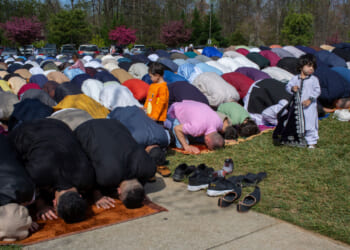 Muslims of different nationalities living in United States gather to perform Eid al-Fitr prayer, marking the end of the fasting month of Ramadan at the Dar Alnoor Islamic Community Center in Prince William county of Virginia.