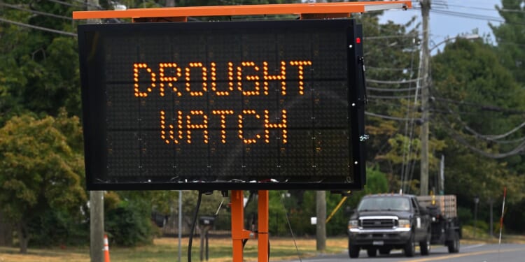 A road sign reminds drivers that the area is under drought watch.