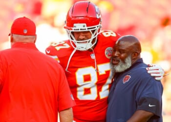 Travis Kelce #87 of the Kansas City Chiefs, is seen in a file photo dated Aug. 22, 2025, greeting former Chiefs offensive coordinator Eric Bieniemy, right, who at the time was running backs coach with the Chicago Bears.
