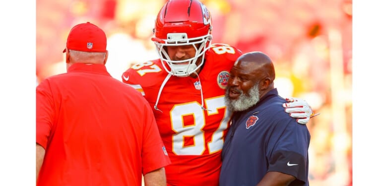 Travis Kelce #87 of the Kansas City Chiefs, is seen in a file photo dated Aug. 22, 2025, greeting former Chiefs offensive coordinator Eric Bieniemy, right, who at the time was running backs coach with the Chicago Bears.