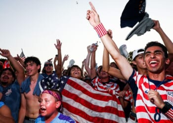 Fans cheer on the United States Wednesday as they face Bosnia and Herzegovina in a knockout round at the FIFA Fan Zone on the National Mall in Washington, D.C.