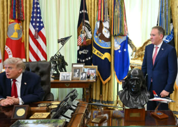 The Administrator of the US Environmental Protection Agency Lee Zeldin (R) looks on as US President Donald Trump speaks after signing a presidential memo on pollution control in vehicles at the Oval Office of the White House in Washington, DC, on June 29, 2026.
