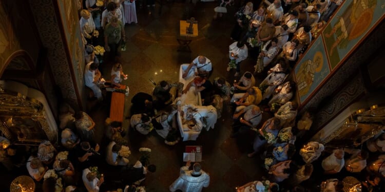 Funeral honors Ukrainian student killed as she helped the victims of a Russian strike