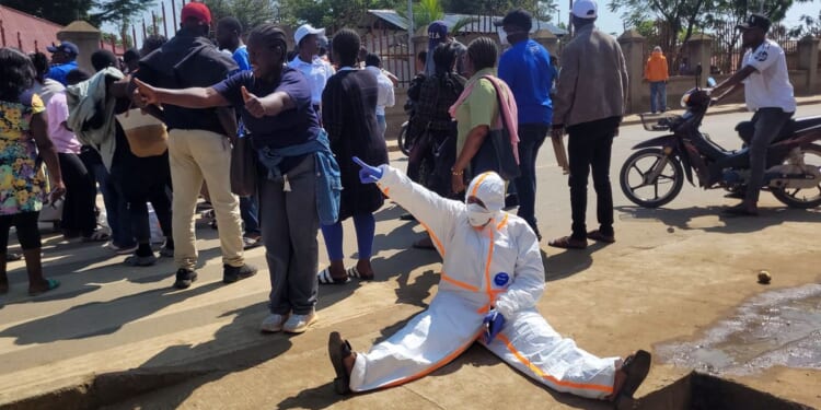 Congo Ebola health workers protest unpaid wages, disrupting response as deaths top 1,800