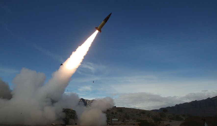 In this image provided by the U.S. Army, soldiers, from the 3rd Battalion, 321st Field Artillery Regiment of the 18th Field Artillery Brigade out of Fort Bragg N.C., conduct live fire testing at White Sands Missile Range, N.M., on Dec. 14, 2021, of early versions of the Army Tactical Missile System. (John Hamilton/U.S. Army via AP, File)