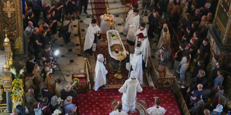 Ukraine honors its ‘collector of souls’ killed while recovering the war dead