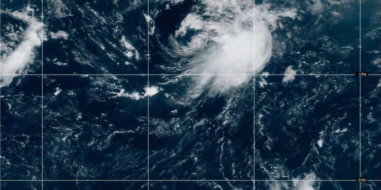 Forecasters warn a Pacific system could soak Hawaii as Tropical Storm Cristobal fades