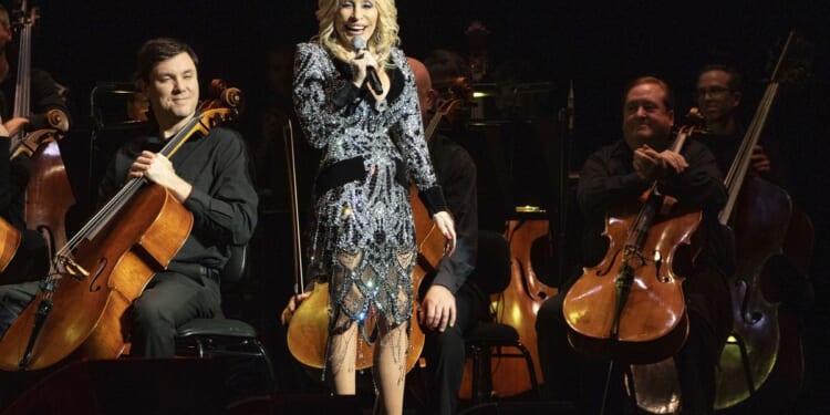 Dolly Parton sidelined by health issues, misses Dollywood ride debut