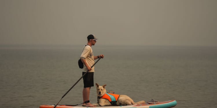 Wildfire in British Columbia harmed 150 structures and forced 20,000 to evacuate