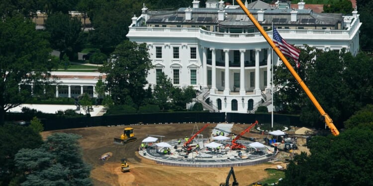 Trump signs marble slab as part of new White House helipad