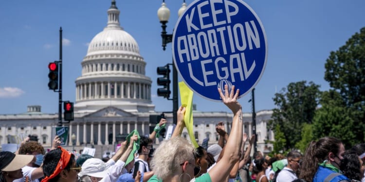 Late-term abortions could surge in blue states that end gestational limits, researchers say