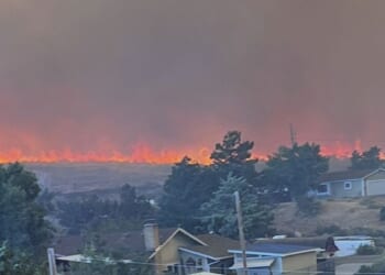 Wildfire approaches Reno, Nevada, forcing thousands to evacuate their neighborhoods