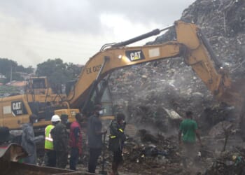 A landslide at a landfill in the capital of Guinea kills 30 people, officials say
