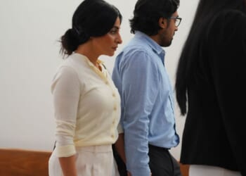 California couple confront their surrogate in a Texas court as dispute over newborn escalates