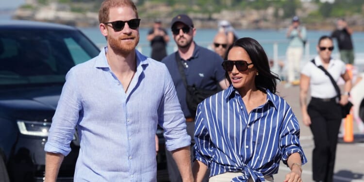 Prince Harry and wife Meghan arrive in Britain as they make a fresh start