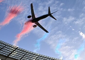 Dramatically low flyby by passenger jets over packed South African stadium sparks safety debate