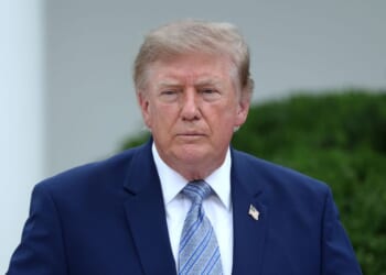 President Donald Trump speaks with guests during an event announcing the expansion of a foster care initiative in the Rose Garden of the White House on Aug. 20, 2026, in Washington, D.C.