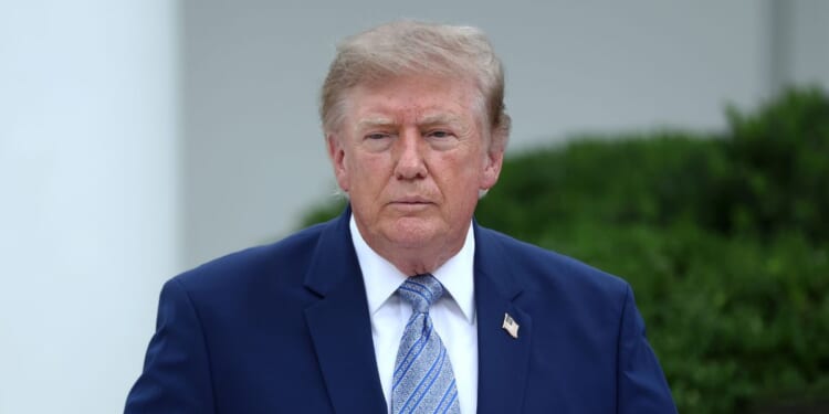President Donald Trump speaks with guests during an event announcing the expansion of a foster care initiative in the Rose Garden of the White House on Aug. 20, 2026, in Washington, D.C.