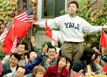 Several thousand people fill the streets around Harvard University for the visit of then Communist Chinese President Jiang Zemin before he spoke on campus 01 November, in Cambridge, MA. Zemin is on a six-city, eight-day tour of the US.