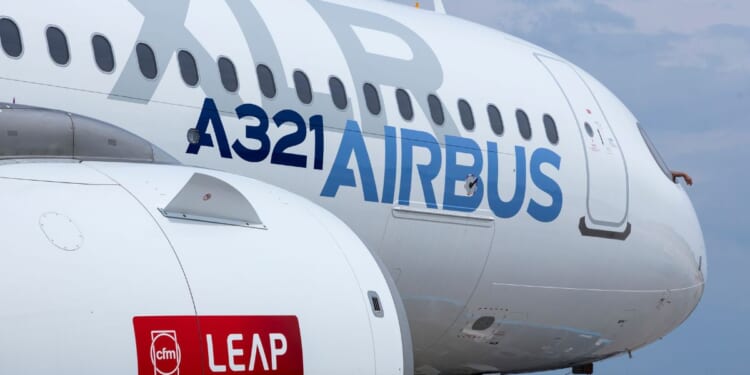 An Airbus A321 XLR aircraft sits at an airport in Berlin, Germany on June 7, 2024.