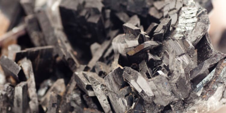 The metal substance Tungsten is pictured under light.