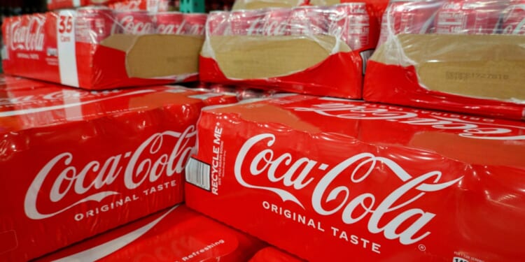 Cases of Coca-Cola soft drink are displayed for sale at a Costco warehouse store on July 29, 2026, in Arlington, Virginia.