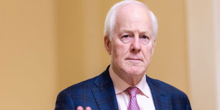 Sen. John Cornyn walks towards the Senate Chambers in the U.S. Capitol Building on Aug. 7, 2026, in Washington, D.C.