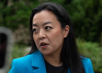 Francesca Hong, the now-defeated contender for Wisconsin's Democratic nomination for governor, speaks to reporters during the state's primary voting on Tuesday.