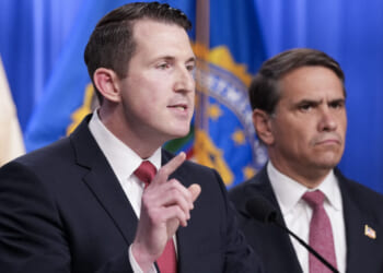 US Assistant Attorney General of the Justice Department's Fraud Division Colin McDonald (R), joined by Acting Attorney General Todd Blanche (R) speaks during a press conference announcing annual healthcare fraud takedown results at the Department of Justice in Washington, DC on June 23, 2026. (Photo by Ken Cedeno / AFP via Getty Images)