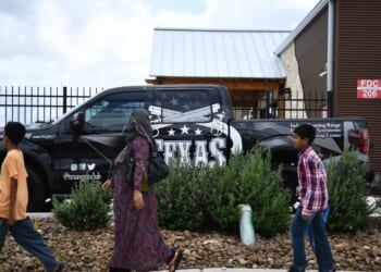 People walk to a Mosque in Stafford, Texas, for the funeral of Santa Fe High School shooting victim Sabika Sheikh, 17, on May, 20, 2018.
