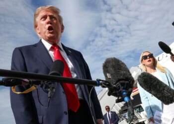 President Donald J. Trump stands near Air Force One in the Joint Base Andrews, Maryland on August 21, 2026.