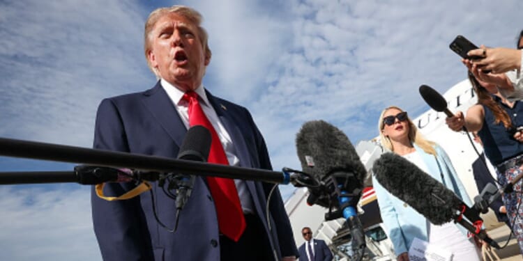 President Donald J. Trump stands near Air Force One in the Joint Base Andrews, Maryland on August 21, 2026.