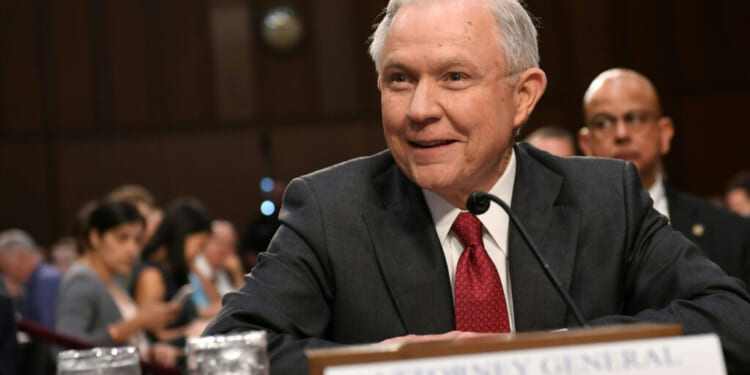 Attorney General Jeff Sessions arrives to testify during a US Senate Select Committee on Intelligence hearing on Capitol Hill.