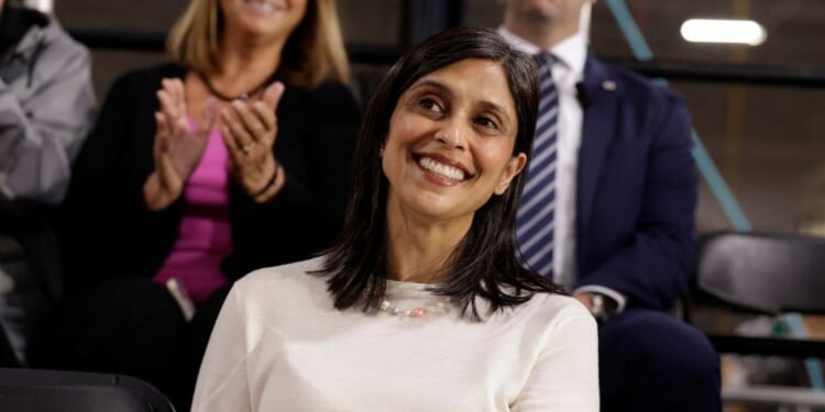 Second Lady Usha Vance listens to her husband Vice President J.D. Vance speak during a visit to the Engineering Design Services Inc. manufacturing facility in Auburn Hills, Michigan, on March 18, 2026.