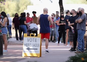 Voters wait in line at the Surprise Court House polling location in Maricopa County, Arizona, on Nov. 3, 2020.