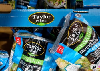 Packages of Taylor Farms Organic Mediterranean Crunch Chopped Kit salad are displayed for sale in a refrigerated section at a Costco Wholesale warehouse on July 29, 2026, in Arlington, Virginia.