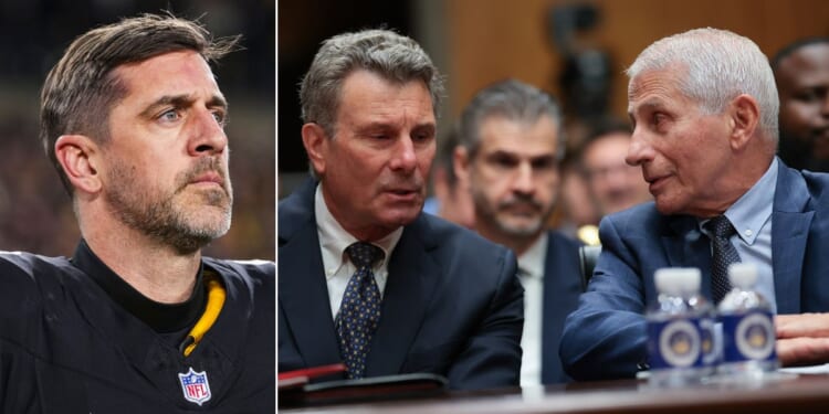 Former NIH Director Anthony Fauci, right, consults with his attorney David Schertler as he testifies before a Senate Homeland Security and Governmental Affairs Committee hearing July 29 in Washington, D.C. Pittsburg Steelers quarterback Aaron Rodgers, left, was unrepentant for his harsh criticism of Fauci Monday on live TV.